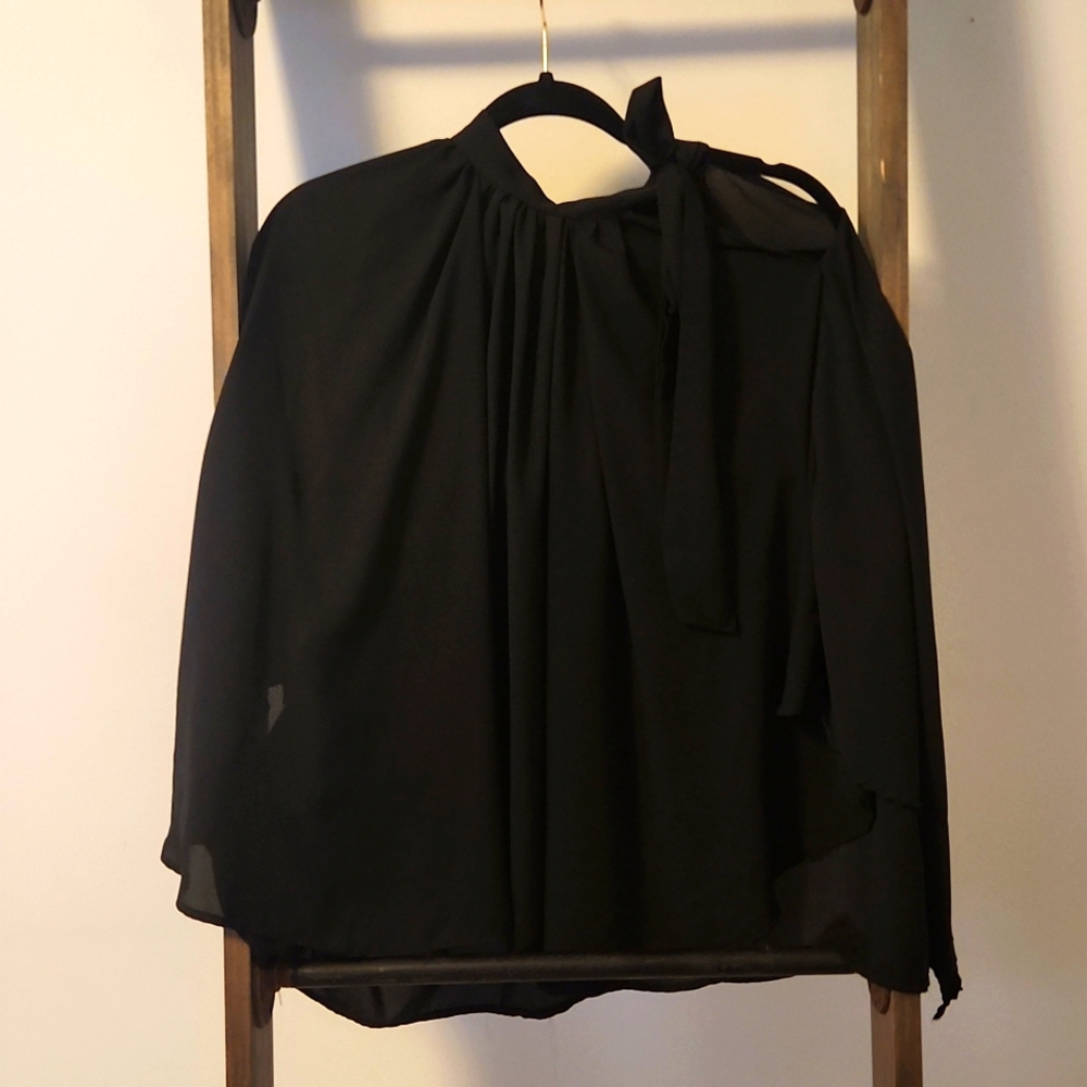 Cape with asymmetrical tie neck